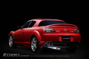 Tomei Expreme Titanium Exhaust System for RX-8 SE3P Early Model 13B-MSP on red Mazda RX-8 showcasing full titanium design.