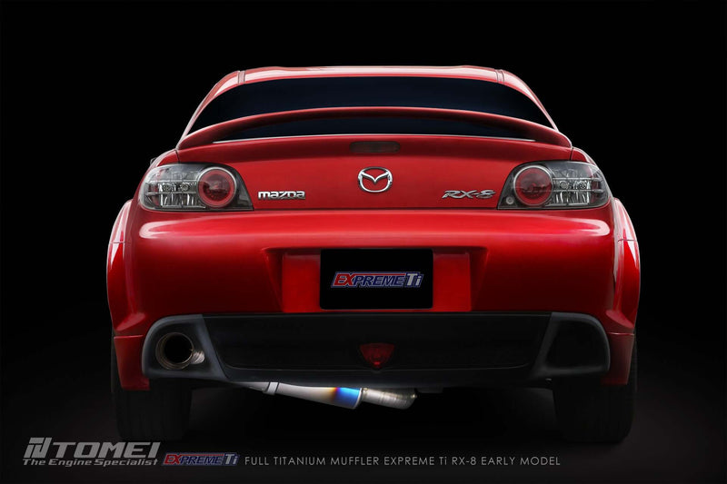 Tomei Expreme Titanium Exhaust System for RX-8 SE3P Early Model 13B-MSP installed on a red Mazda RX-8.