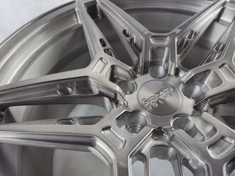 Symmetry Forged Wheels - SF-02 - Black Machine Dark Tint close-up showing intricate design and finish.