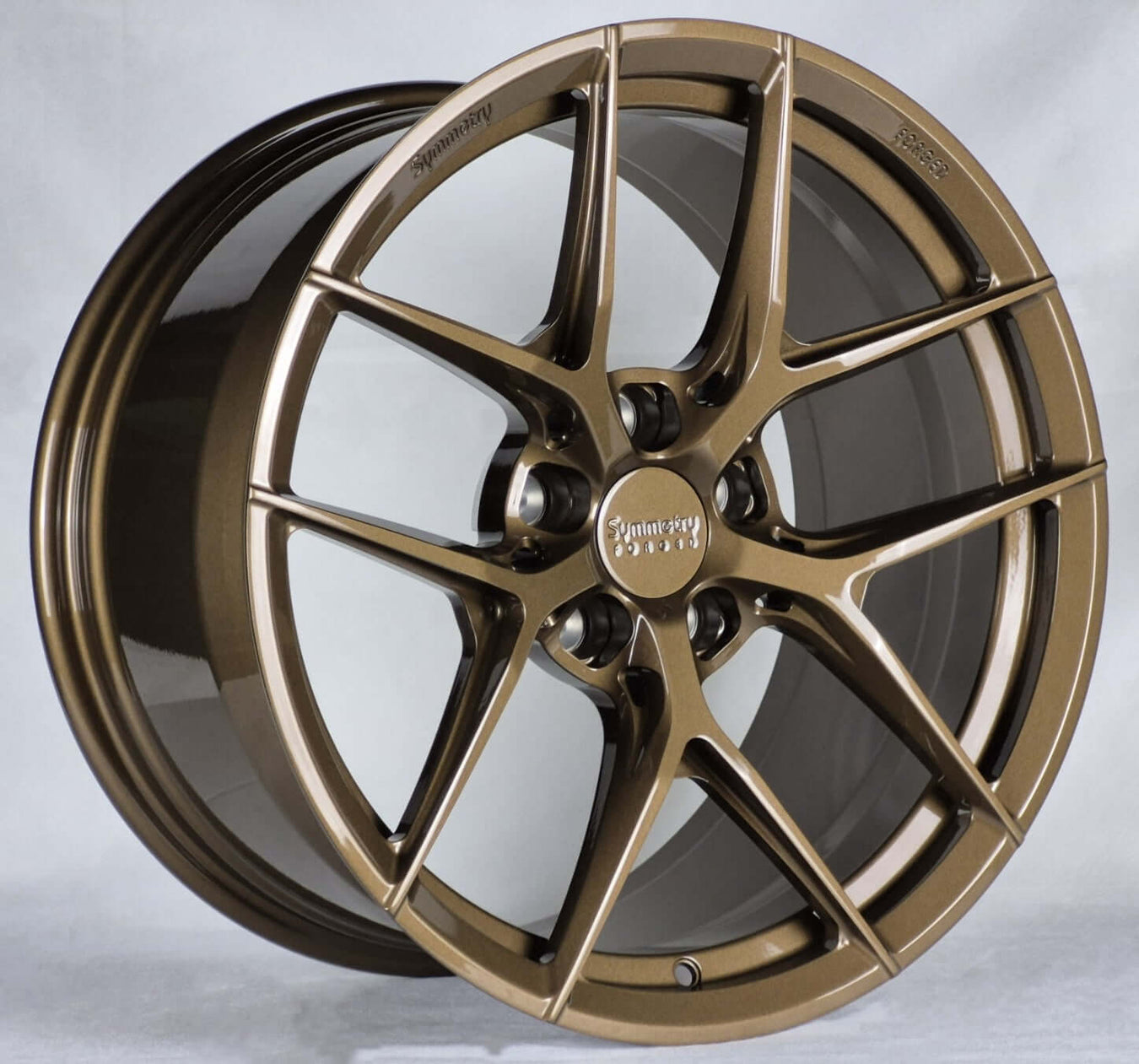 Symmetry Forged Wheels - SF-07 - Gloss Bronze showcasing full forged construction and stylish design.