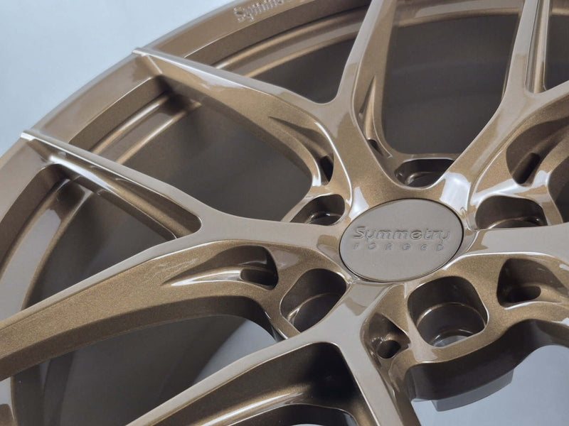 Symmetry Forged Wheels - SF-07 - Gloss Bronze close-up showcasing intricate design and finish.