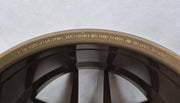 Symmetry Forged Wheels - SF-07 - Gloss Bronze showcasing intricate markings on the wheel lip.